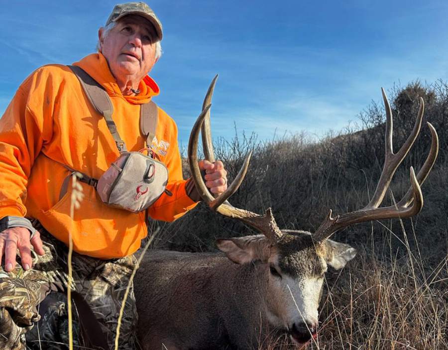 Father and son with a South Dakota trophy buck